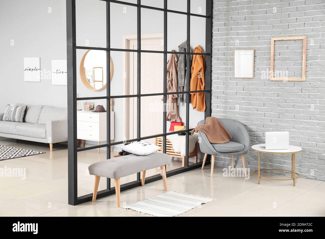 Stylish interior of modern hall in studio apartment Stock Photo - Alamy