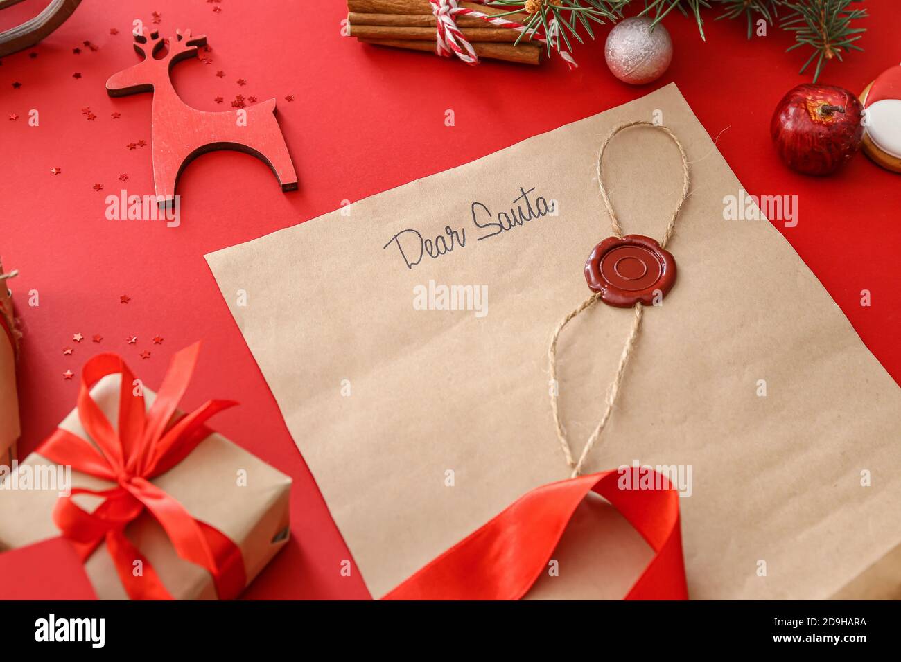 Letter to Santa and Christmas decor on color background Stock Photo - Alamy