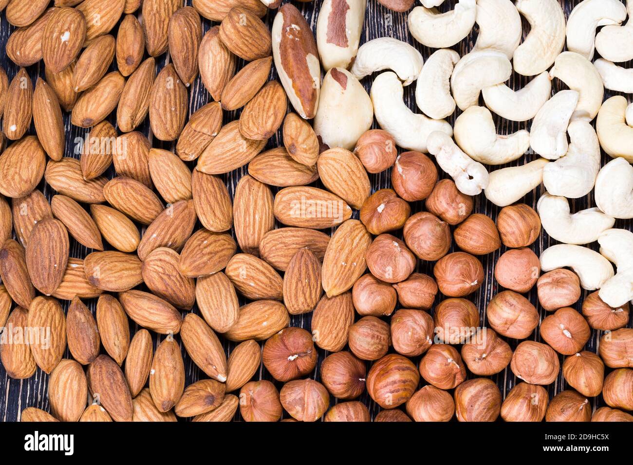 mixed together cashews, almonds and hazelnuts Stock Photo Alamy