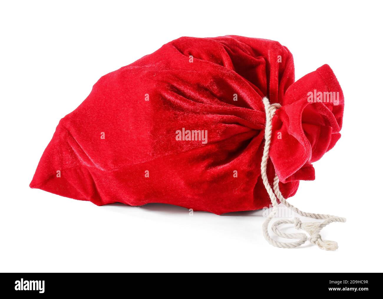 Santa Claus bag full of gifts on white background Stock Photo - Alamy