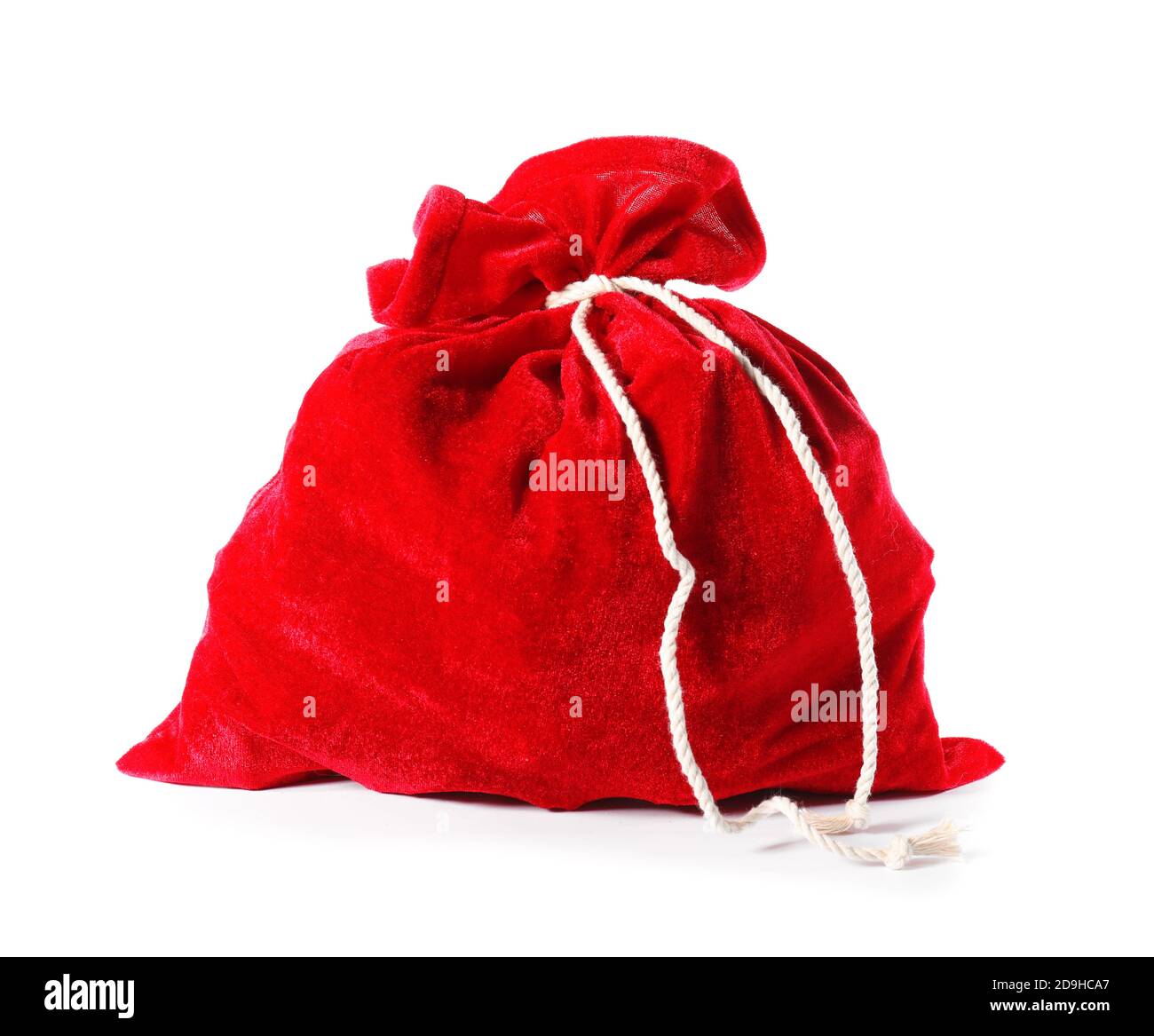 Santa Claus bag full of gifts on white background Stock Photo - Alamy