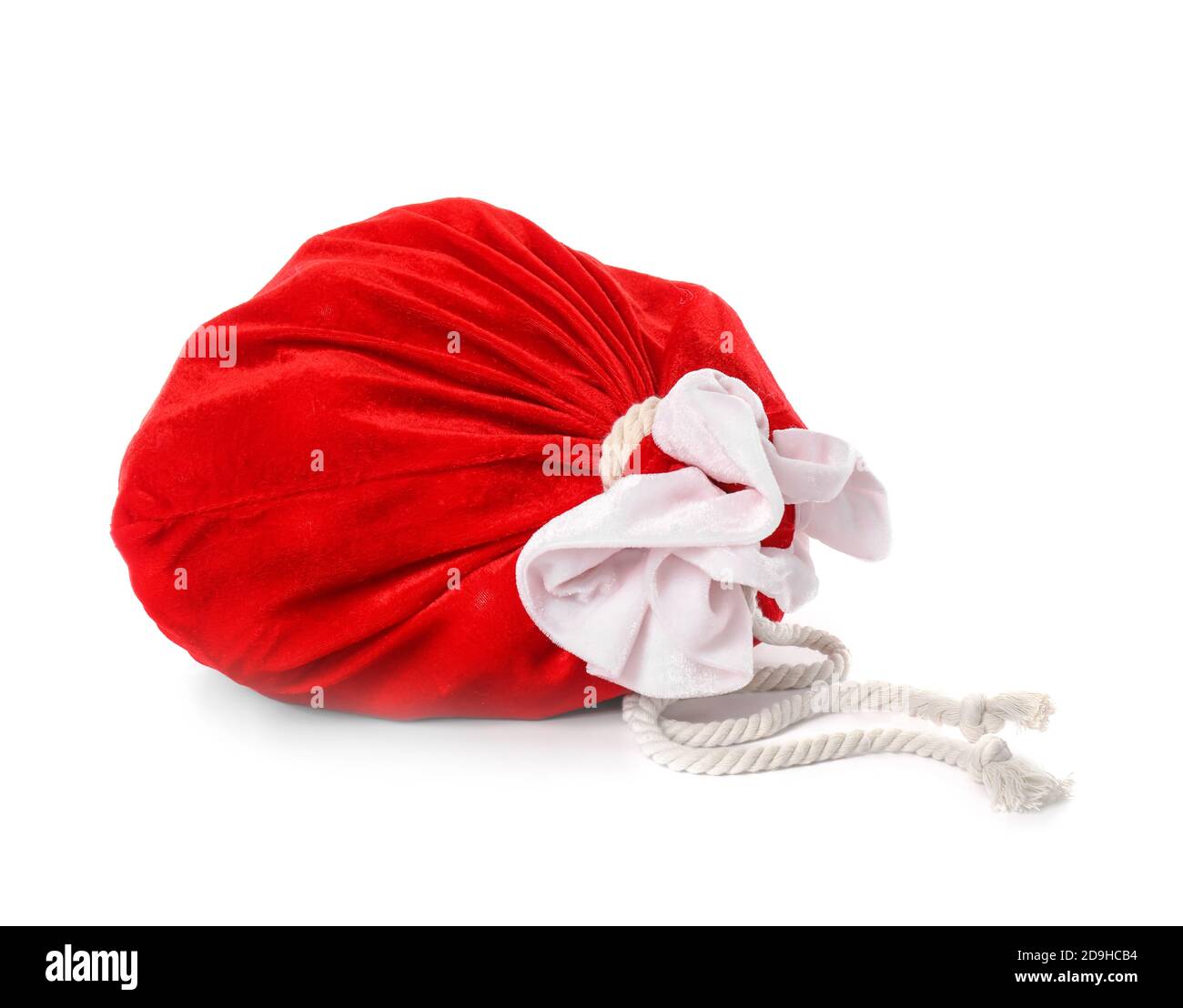 Santa Claus bag full of gifts on white background Stock Photo - Alamy