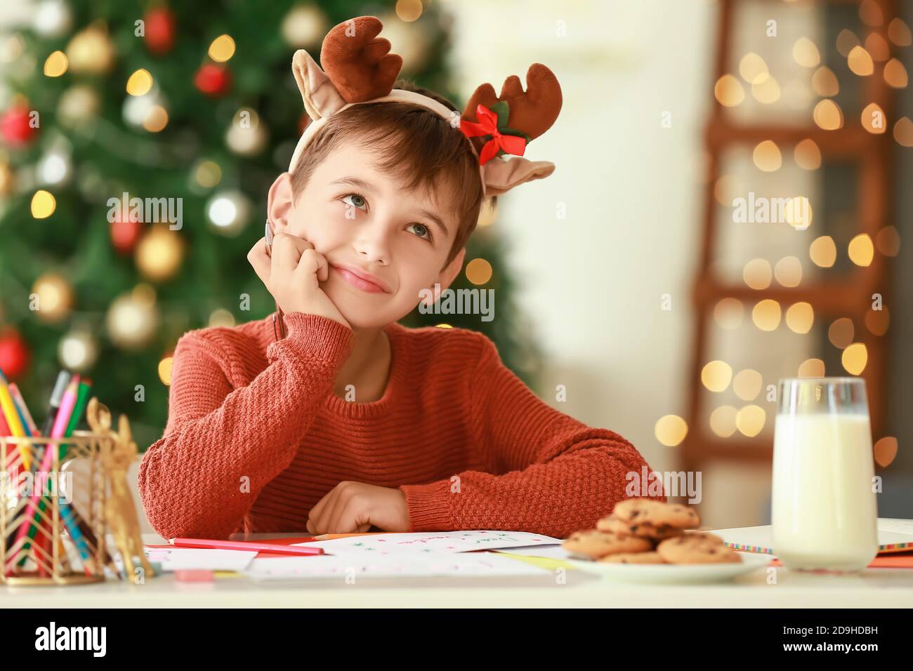 little-boy-writing-letter-to-santa-at-home-on-christmas-eve-stock-photo-alamy