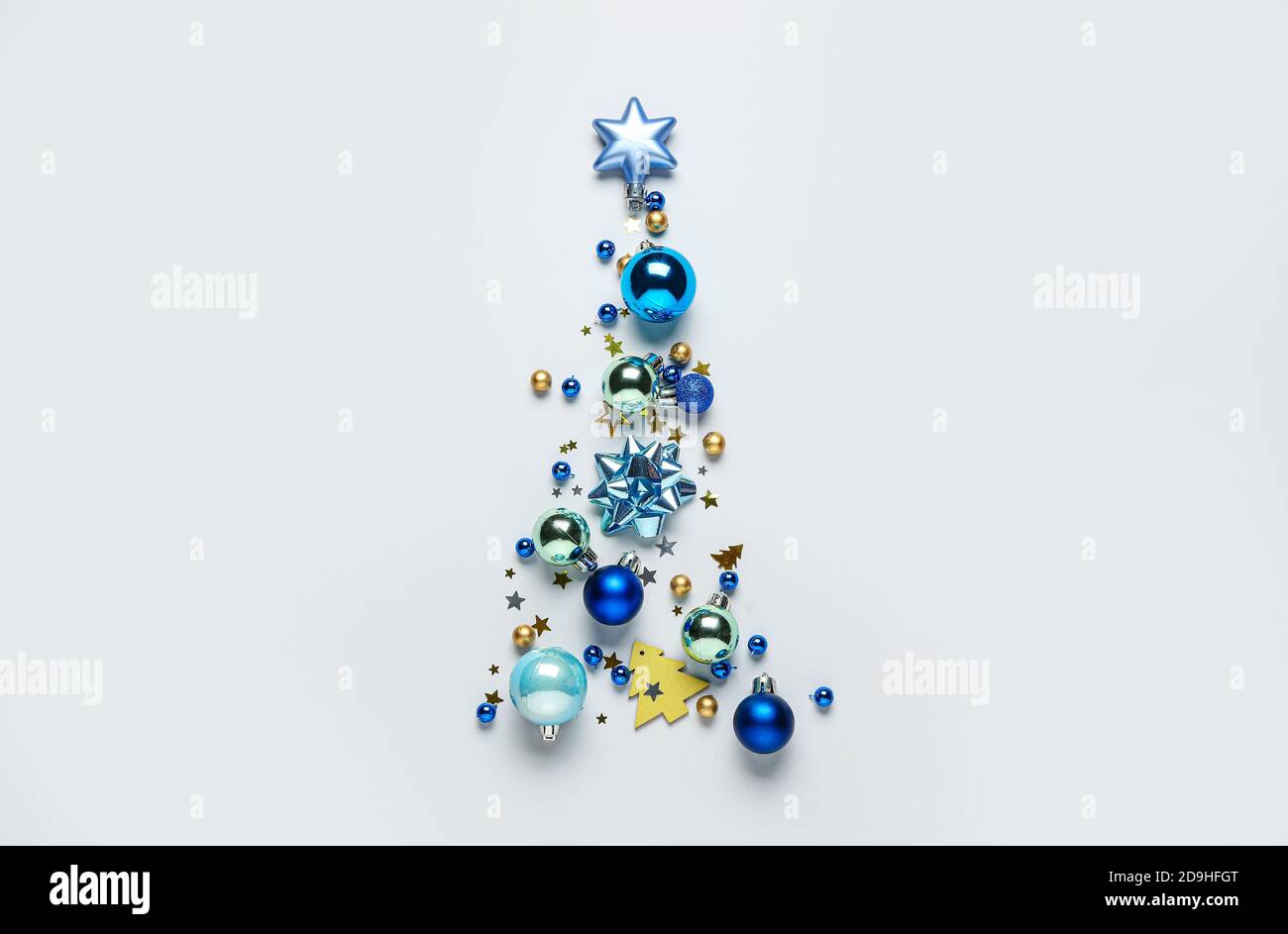 Beautiful Christmas tree made of decor on white background Stock Photo ...