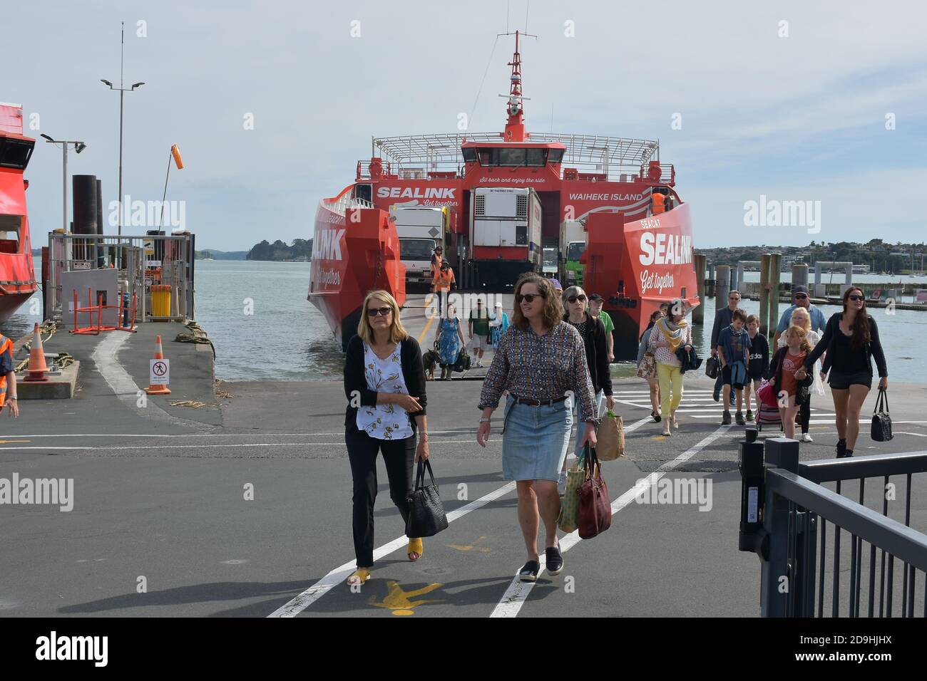 passengers walking from Sealink crossover ferry arrived from Waiheke Island to Half Moon Bay