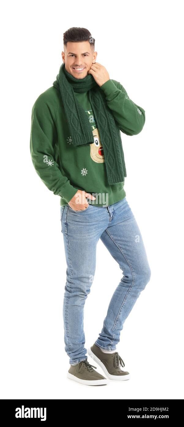 Handsome young man in winter clothes on white background Stock Photo ...