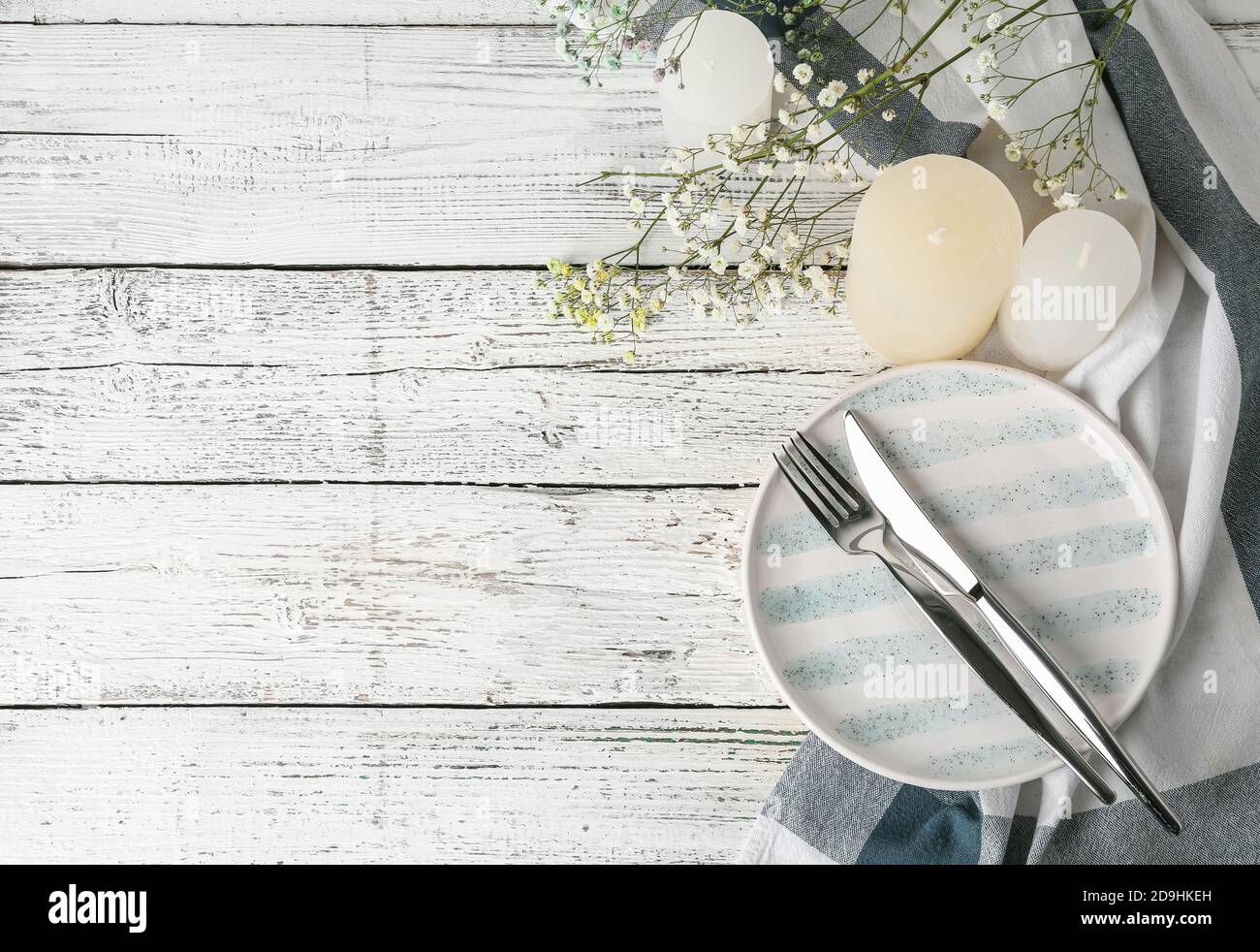 Beautiful table setting on light background Stock Photo - Alamy