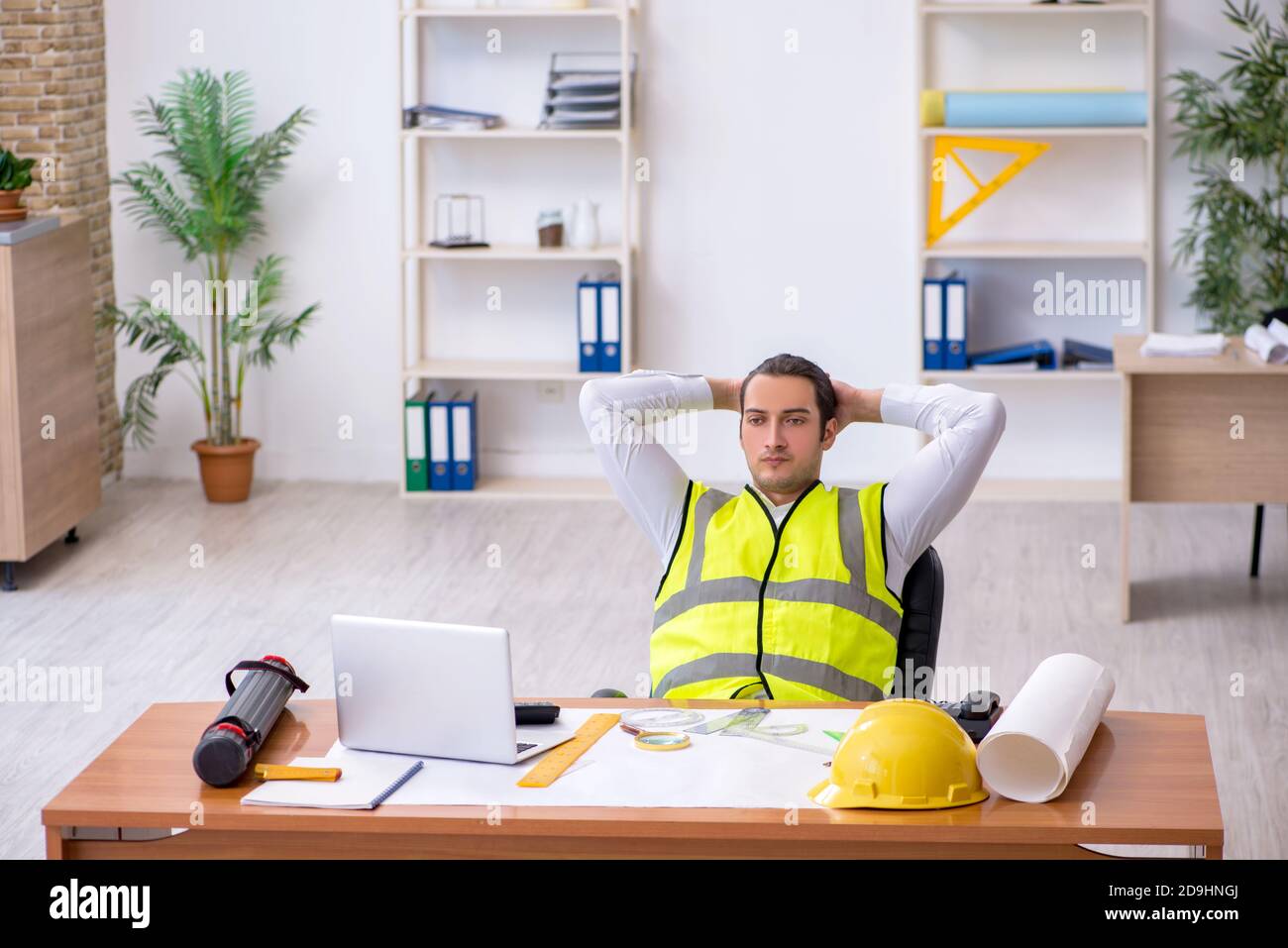 Young architect working in the office Stock Photo