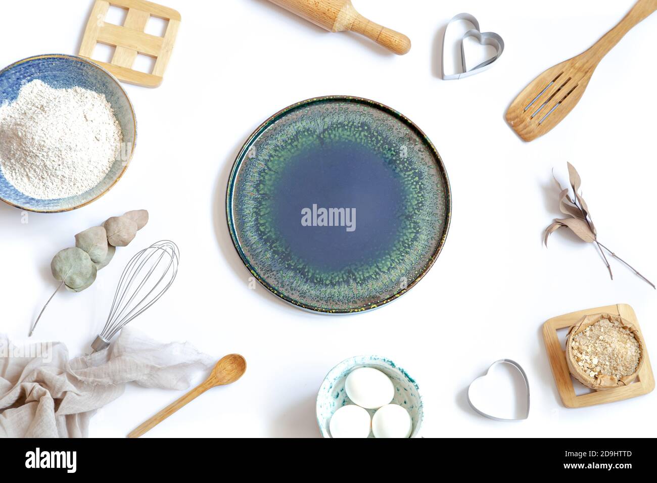 Composition with baking ingredients and kitchen accessories on a white background. Stock Photo