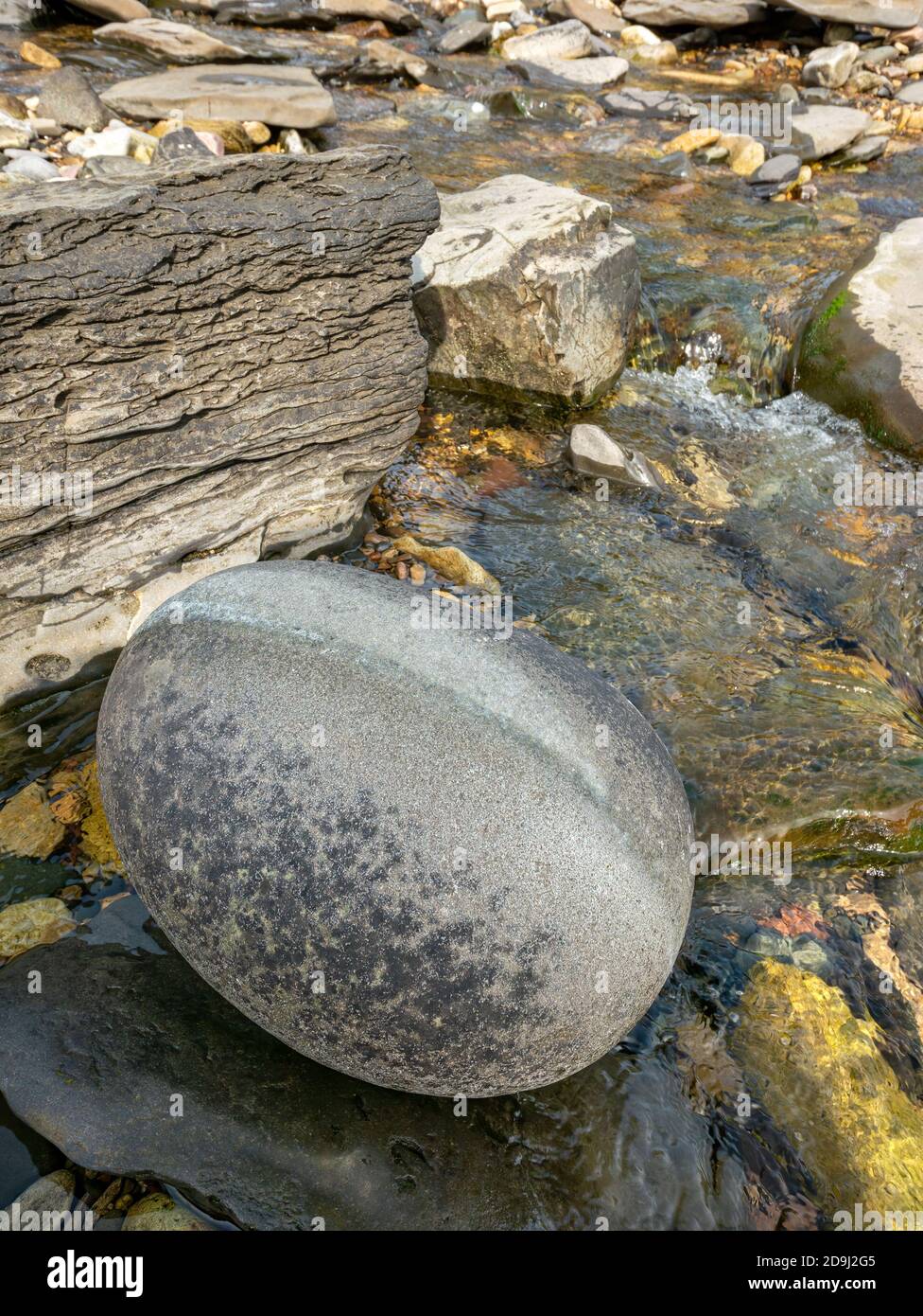 Large, smooth round, oval, eggshaped rock on Boreraig Beach, Isle of
