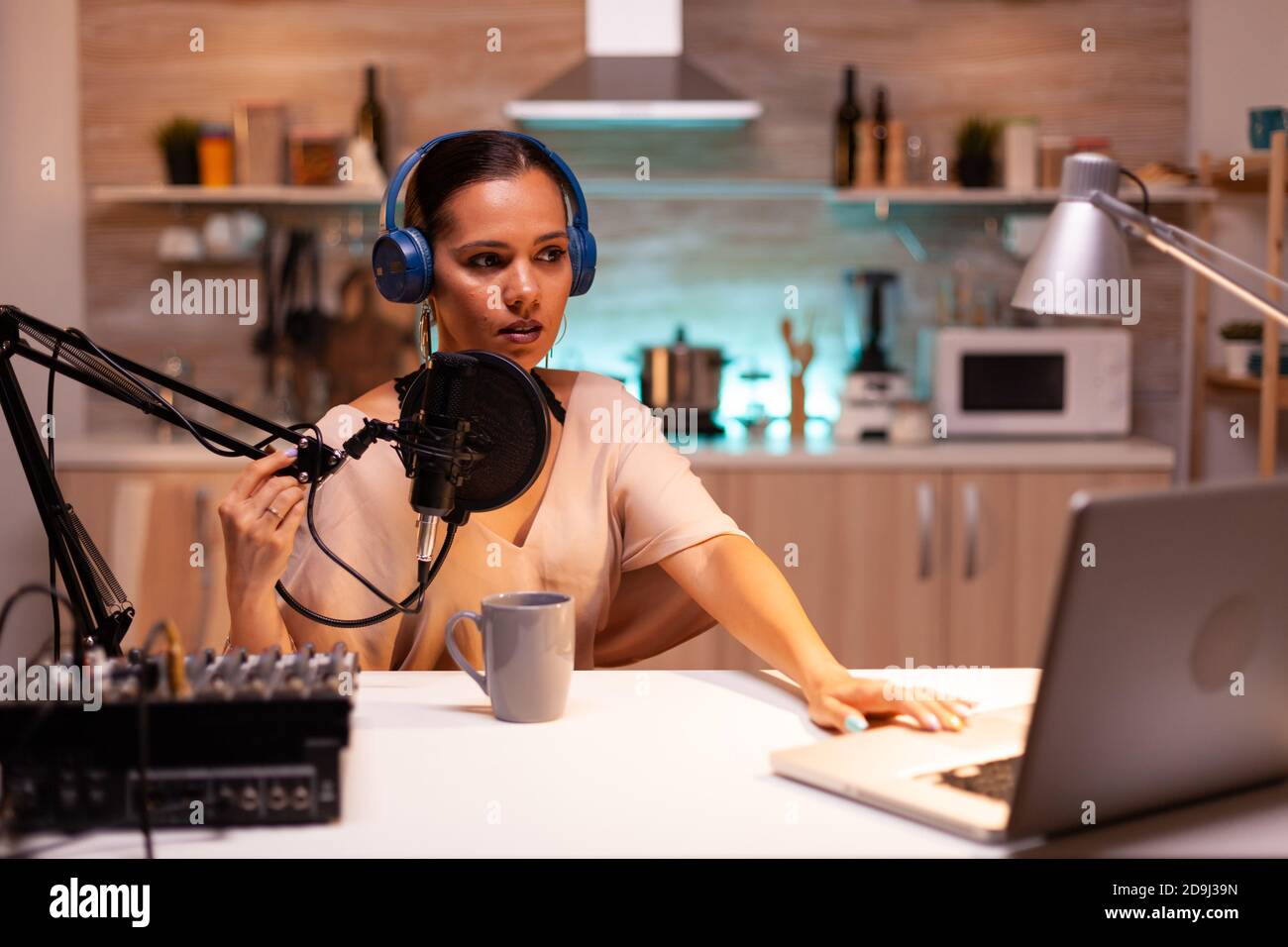 Famous blogger streaming from home studio using professional recording ...