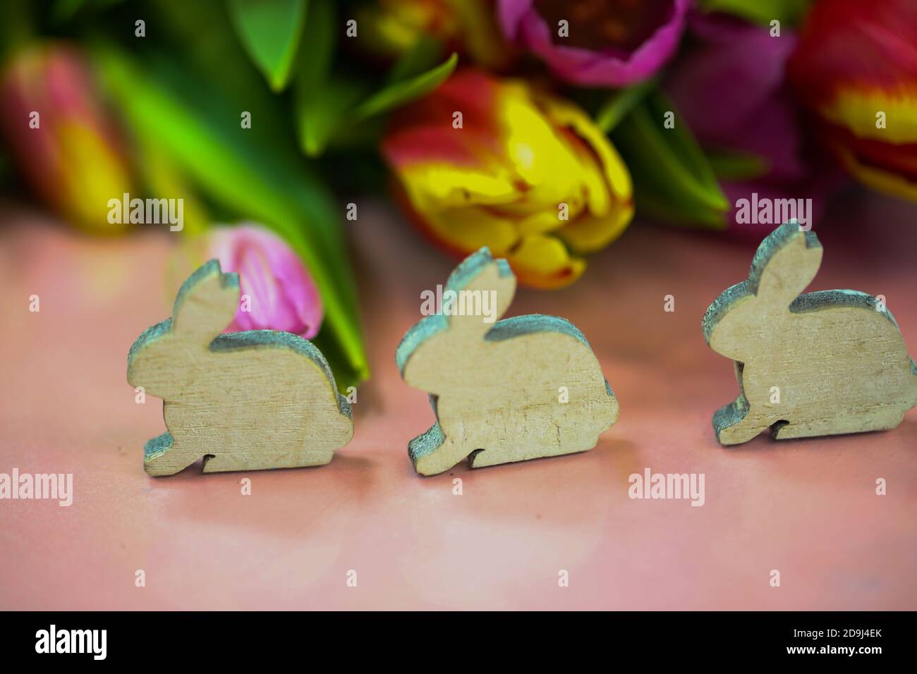 easter bunny with tulips, background Stock Photo - Alamy