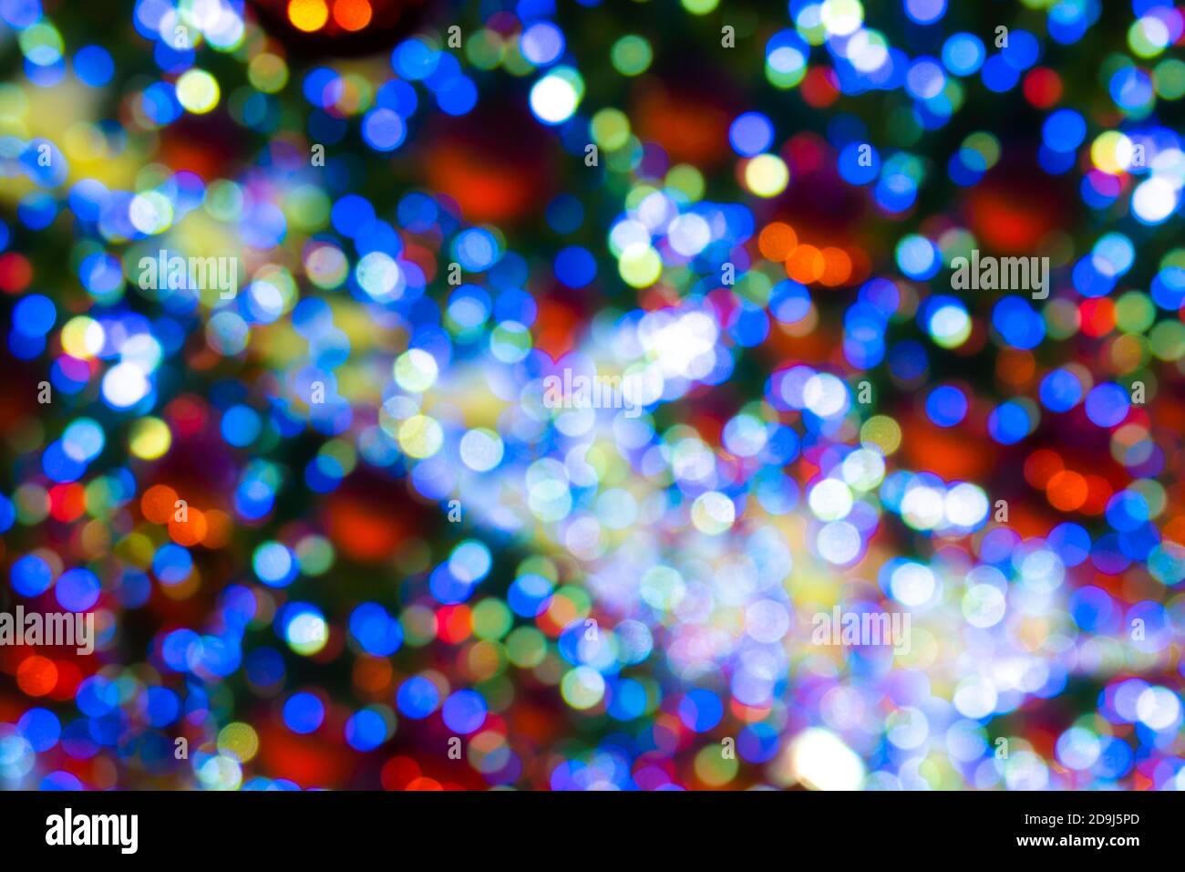 blurred New Year's decoration background on the street, unfocused background Stock Photo