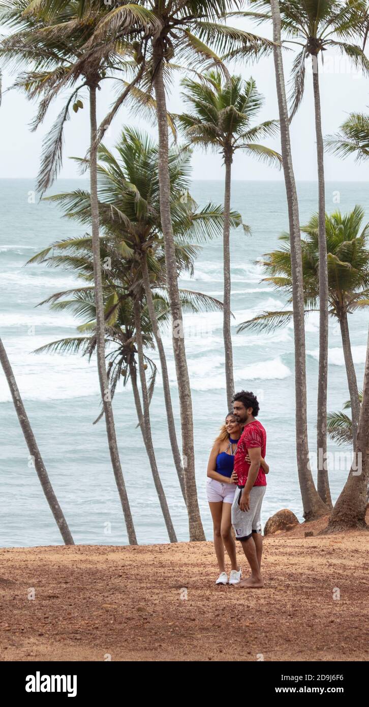 Weligama, Southern Province / Sri Lanka - 07 26 2020: young beautiful Sri Lankan Couple in Mirissa coconut tree hill. Stock Photo