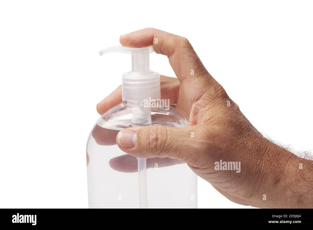 Human hand holding a plastic bottle with disinfectant isolated on white Stock Photo