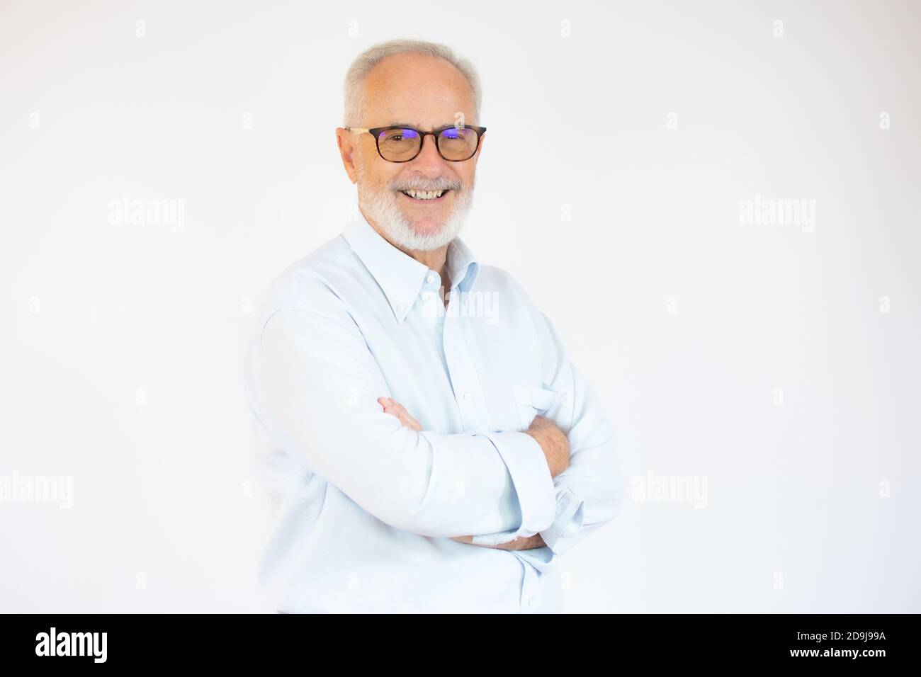 Portrait of cheerful senior man who is looking at camera and smiling ...