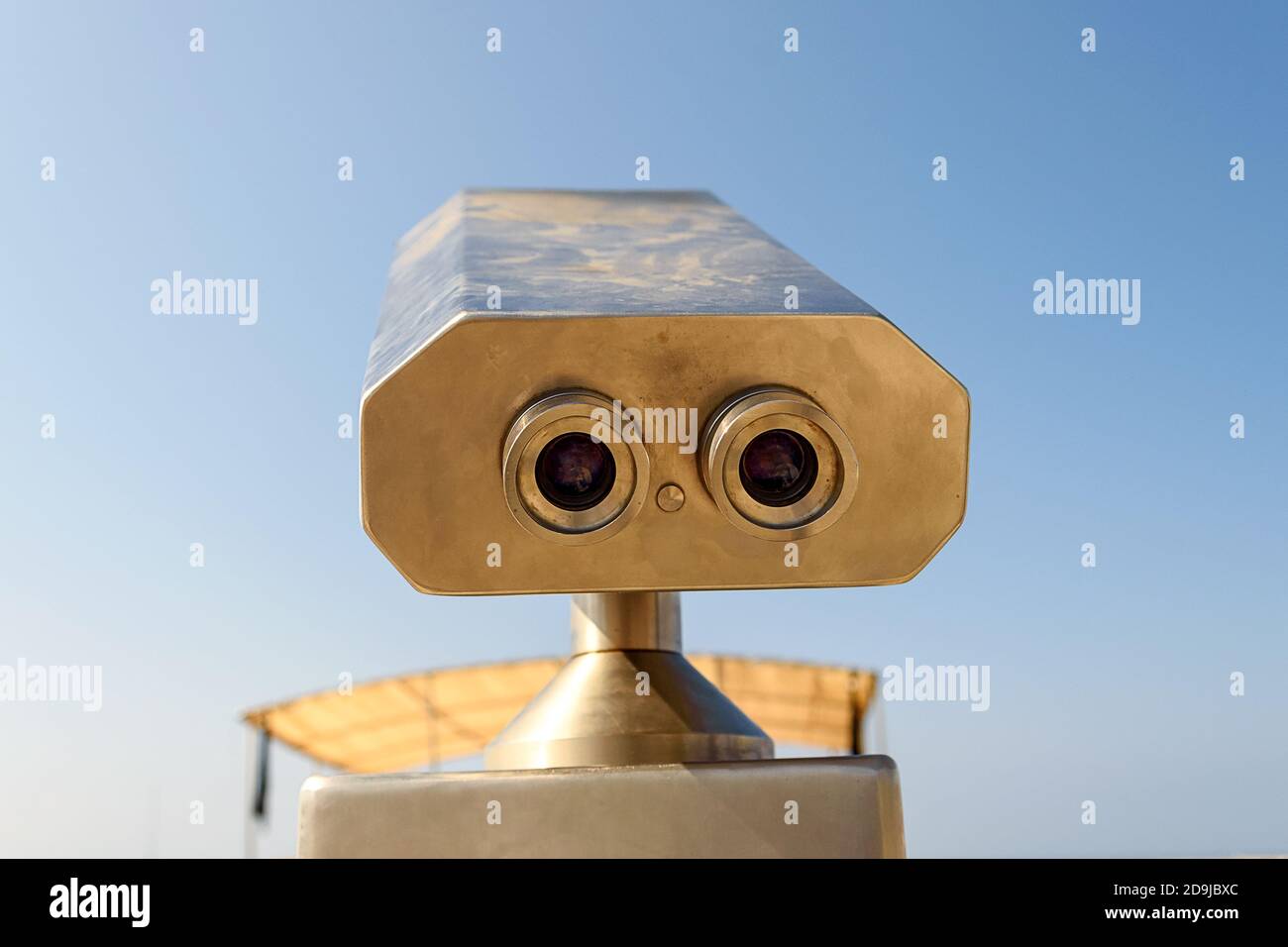 Tourist binoculars closeup against the sky. For sightseeing Stock