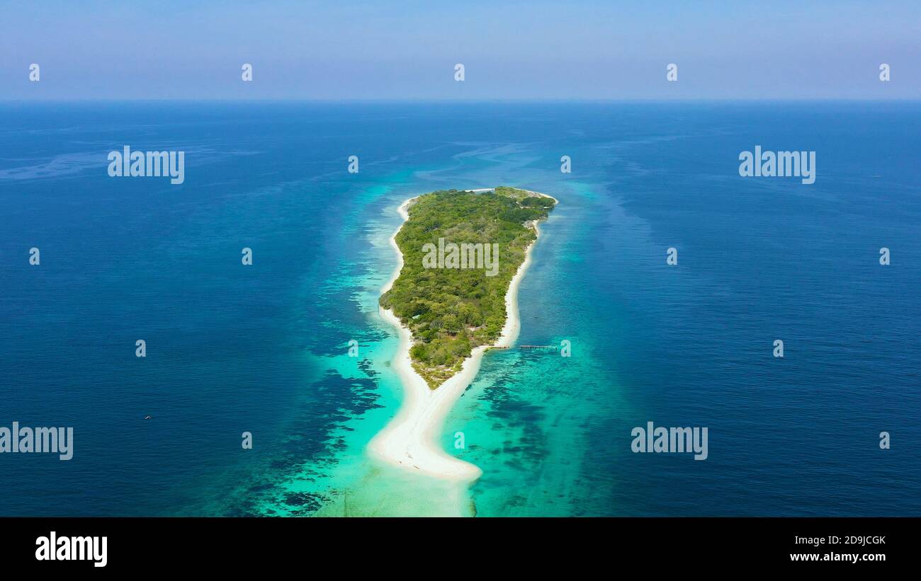 Tropical island with sand beach, top view. Little Santa Cruz Island