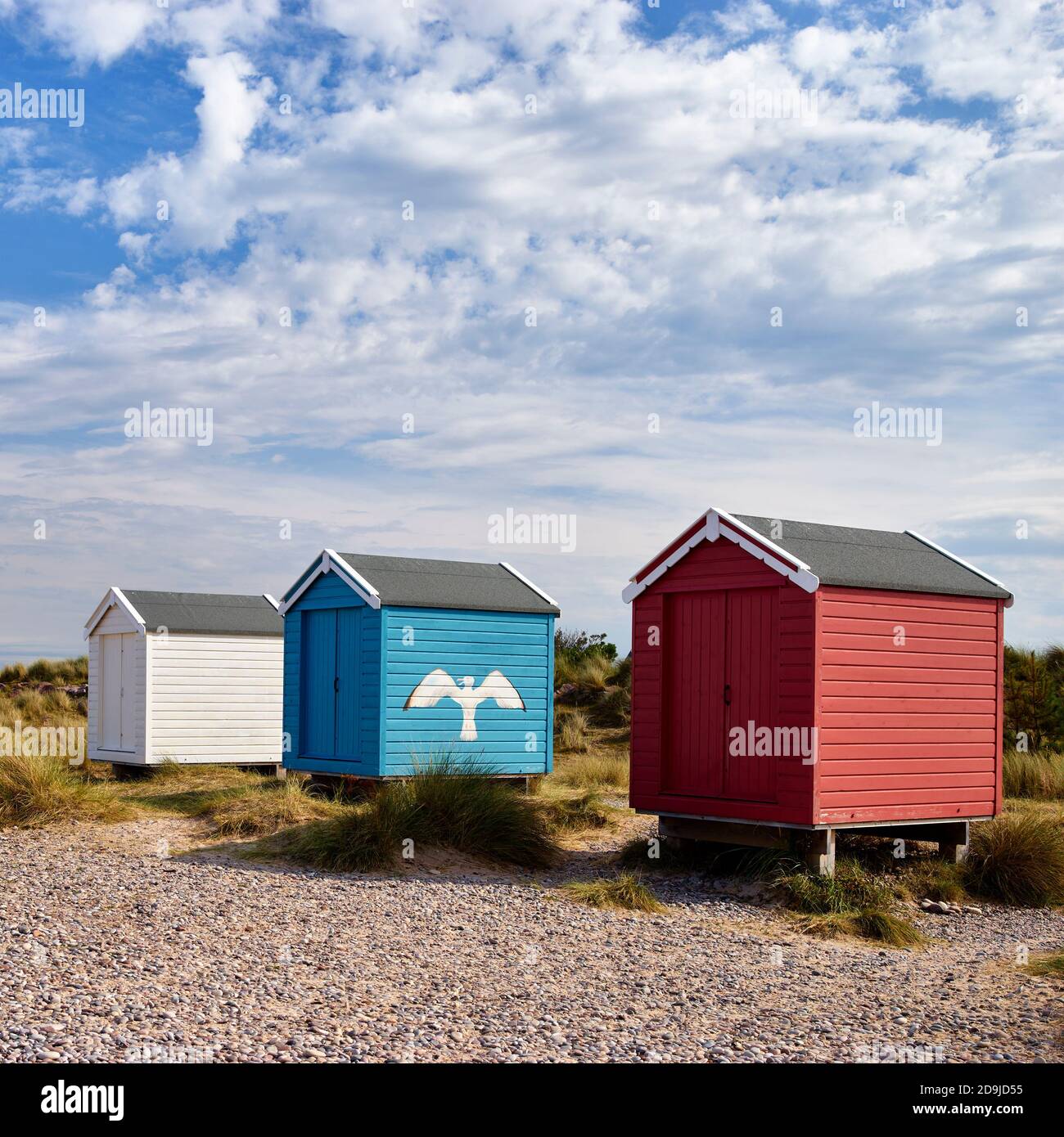 Colouful beach huts at Findhorn beach, Moray, Scotland. Stock Photo
