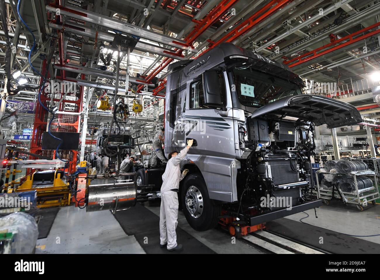 Beijing, China's Jilin Province. 23rd Sep, 2020. Workers assemble vehicles at a factory of the First Automotive Works (FAW) Group Co., Ltd. in Changchun, capital of northeast China's Jilin Province, Sept. 23, 2020. Credit: Zhang Nan/Xinhua/Alamy Live News Stock Photo