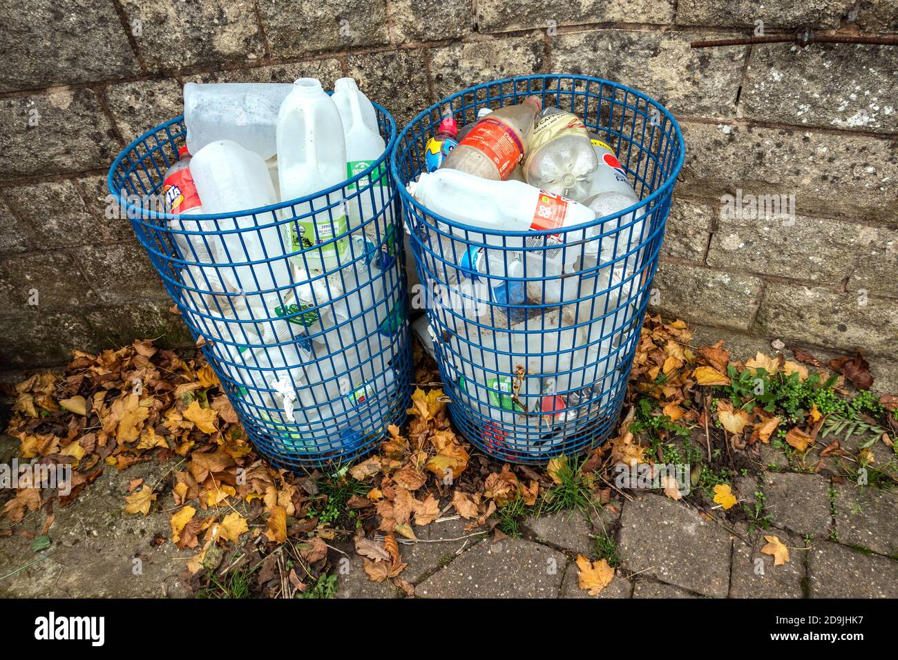 2 waste bins full of empty plastic bottles for recycling Stock Photo ...