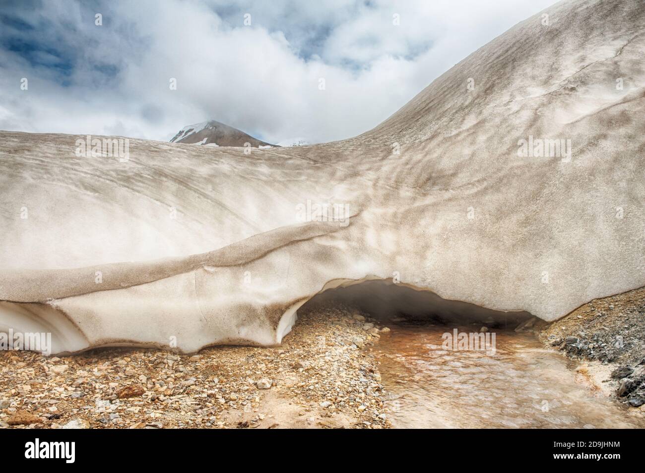 Iceland is a land of ice and fire. In the geothermal area Kerlingarfjoll one can see smoke and boiling fumaroles from the geothermal field as well as Stock Photo