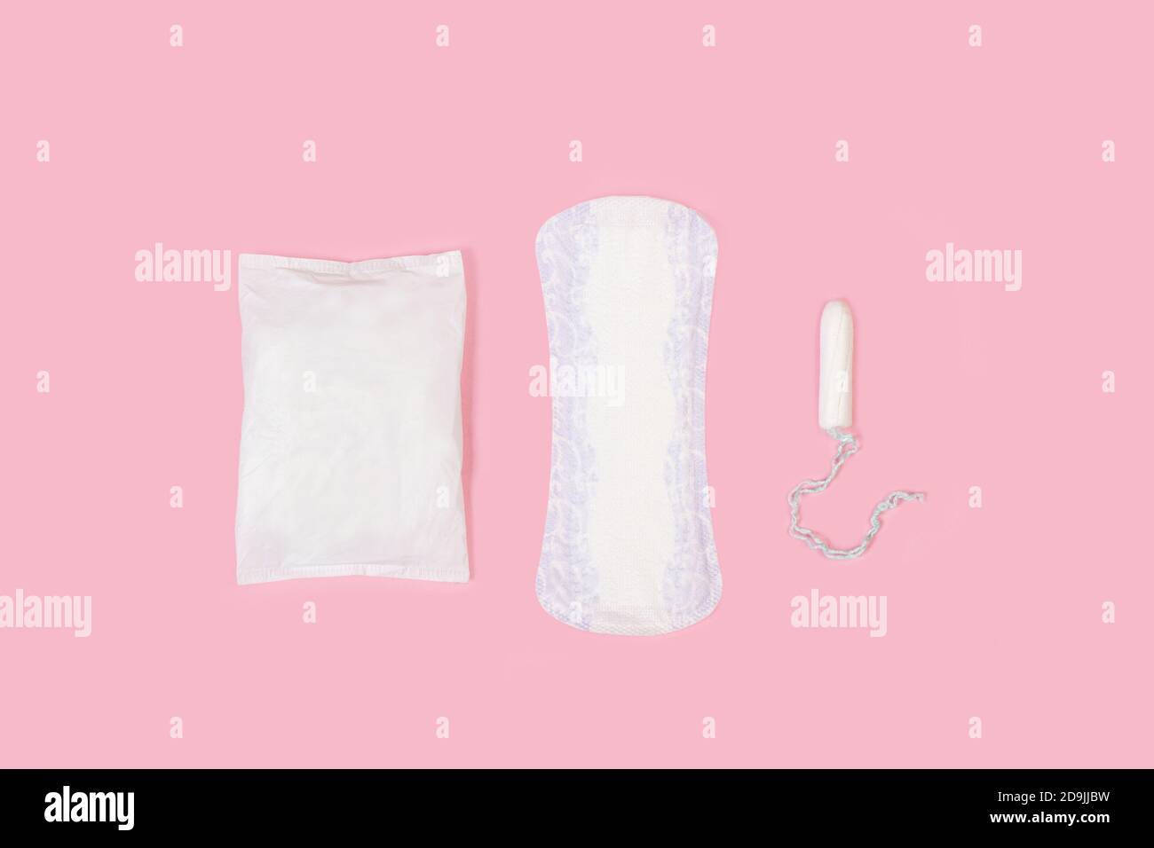 Tampon and period pad on a pink background Stock Photo Alamy