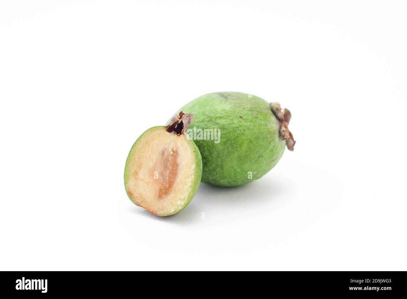 Feijoa fruit cut half on white background Stock Photo