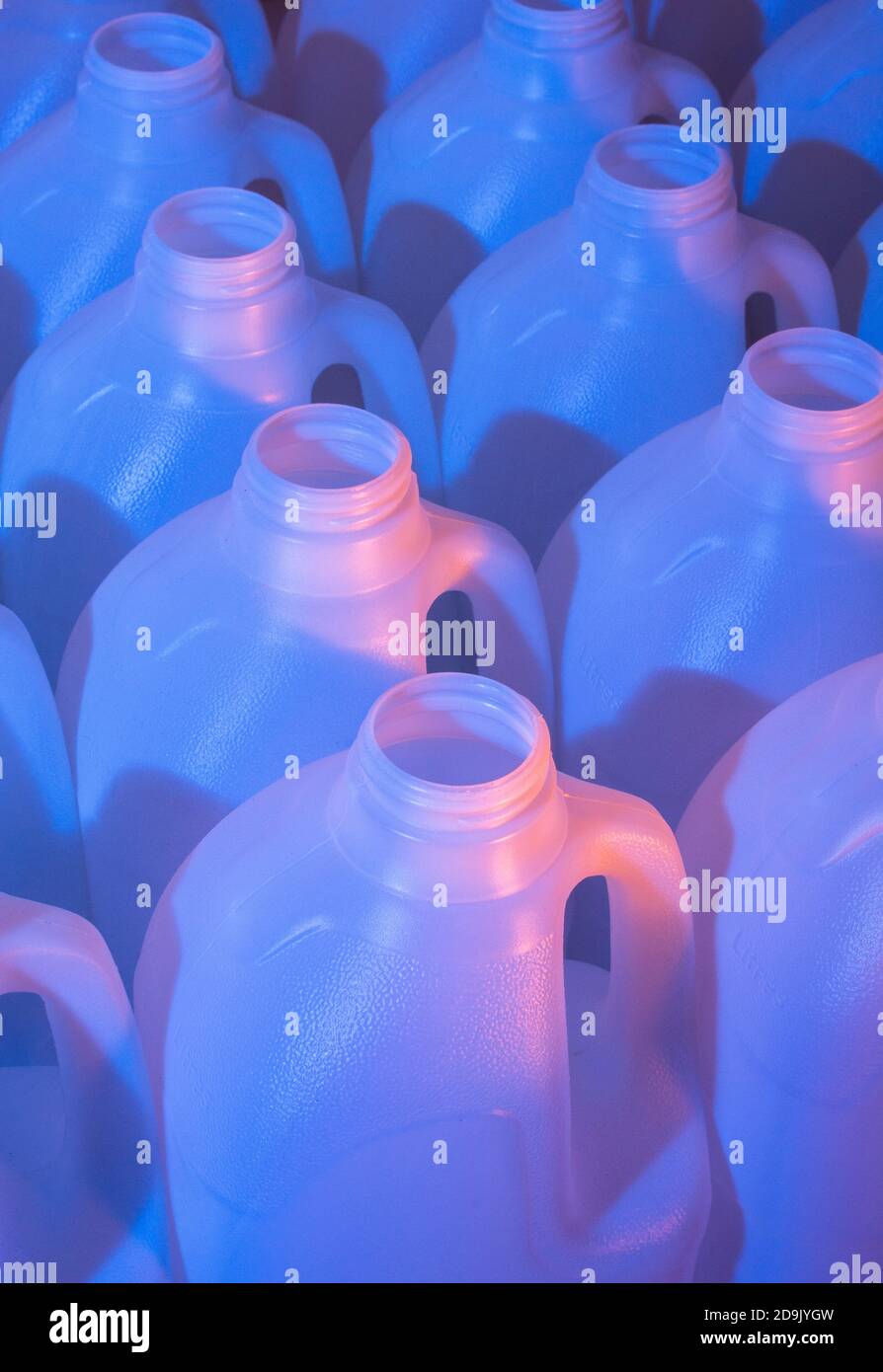 Nampak 2litre poly HDPE milk bottles lit by coloured gels. Abstract