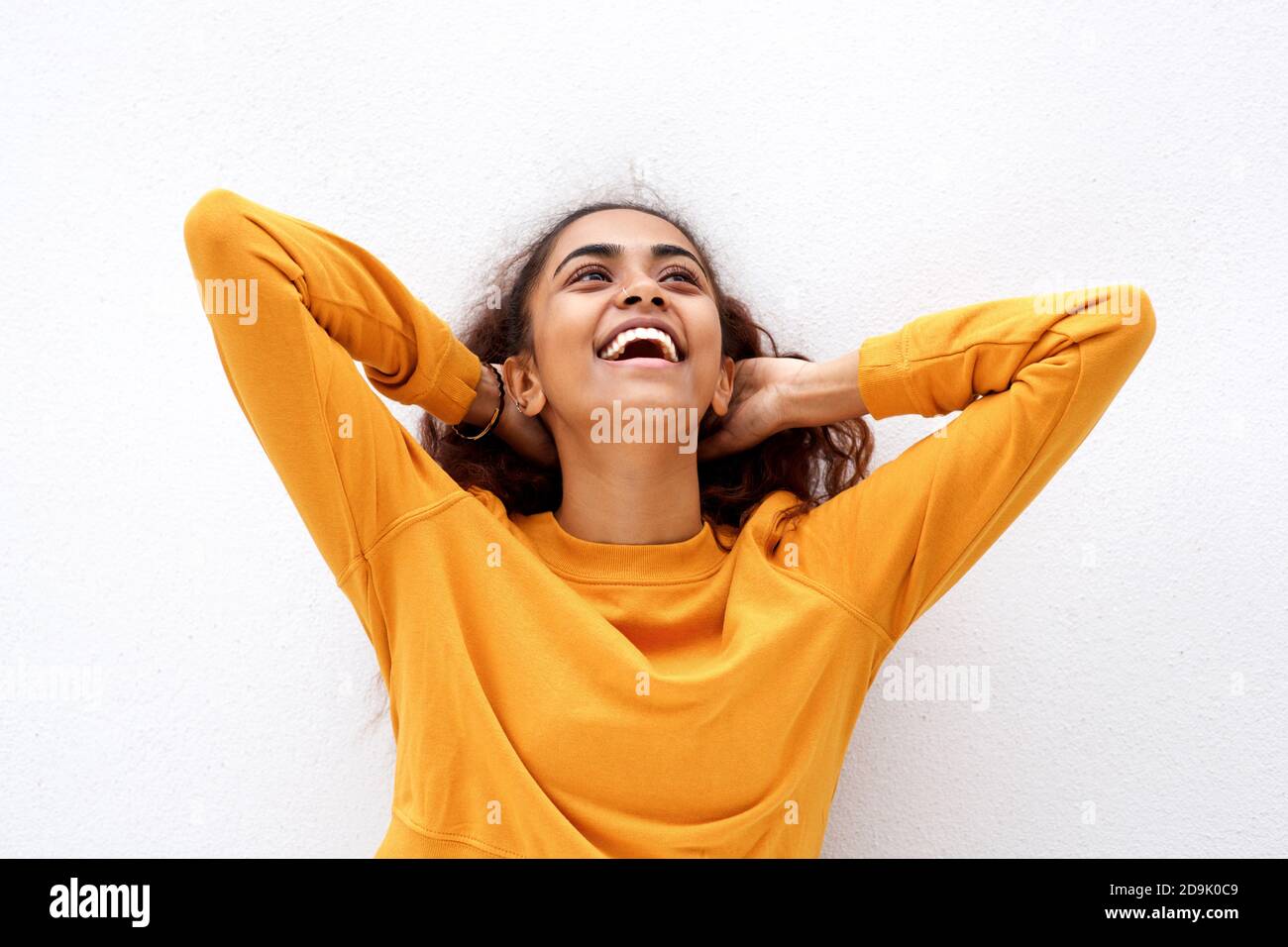 Close Up Portrait Carefree Young Indian Woman Laughing With Hands