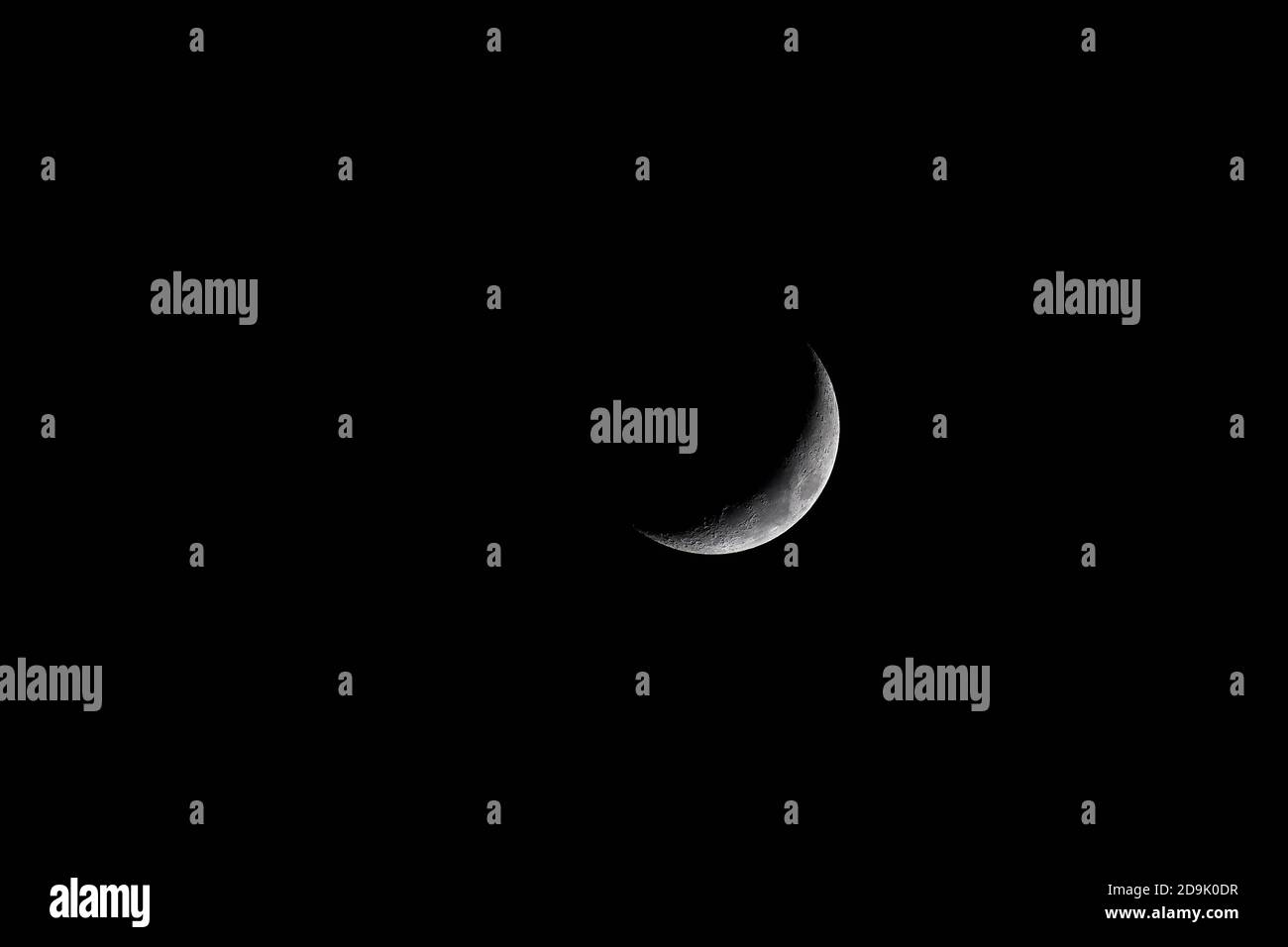 Waxing Crescent. Young moon on black background Stock Photo