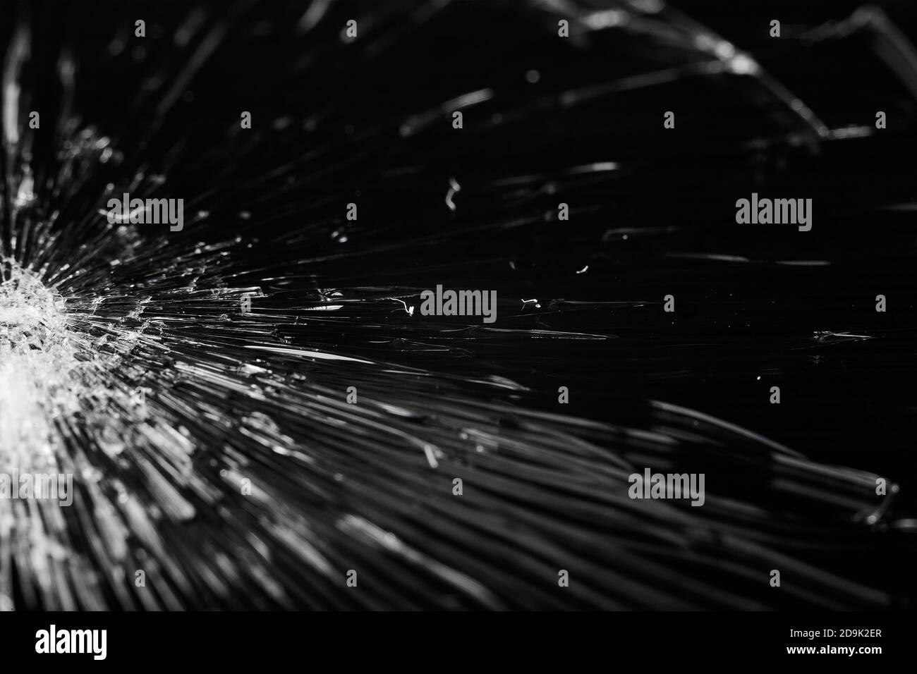 Broken glass - white lines on black background, design element. touch screen smartphone with broken screen Stock Photo