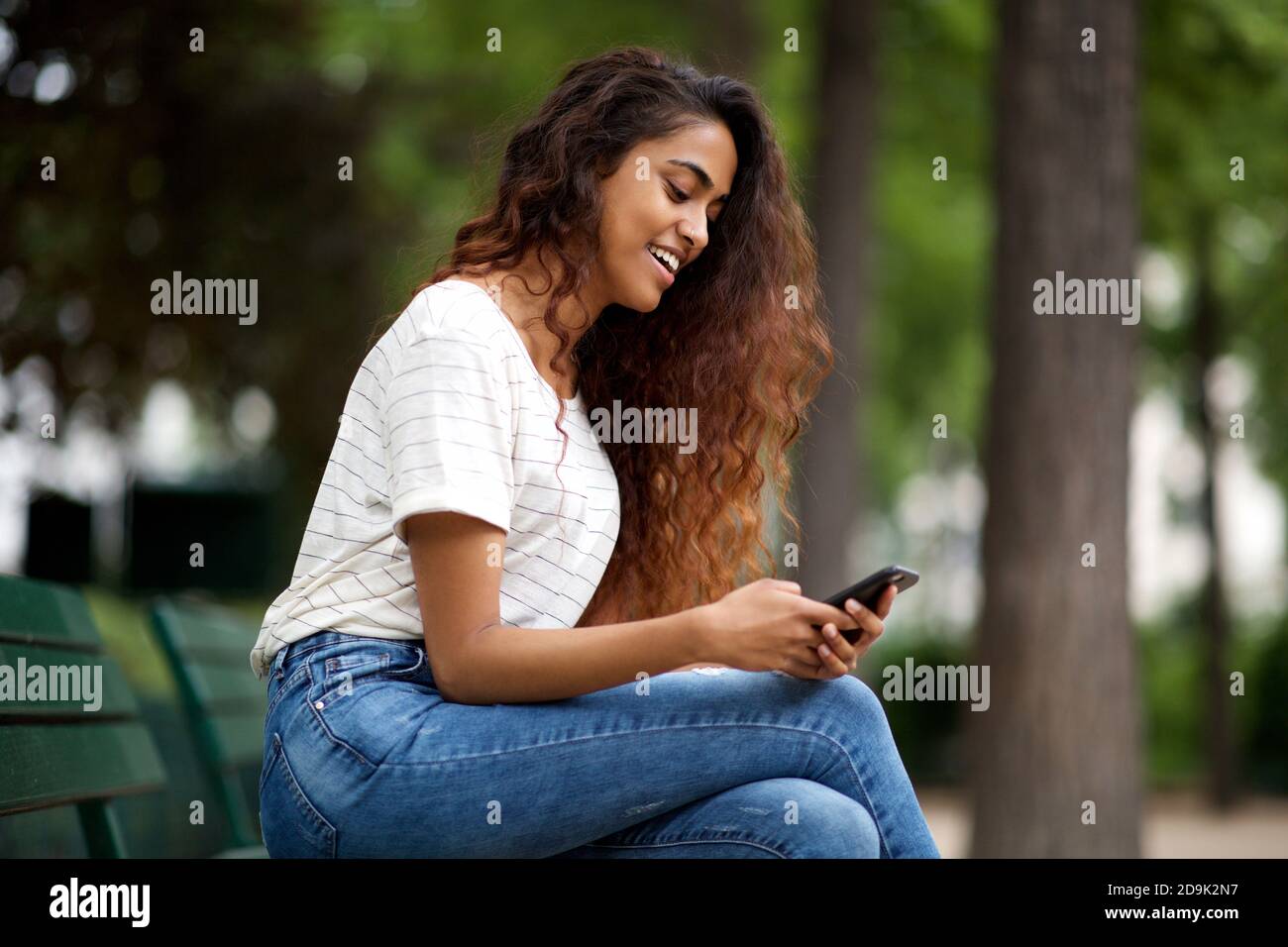 Indian girl sitting on bench hi-res stock photography and images - Alamy