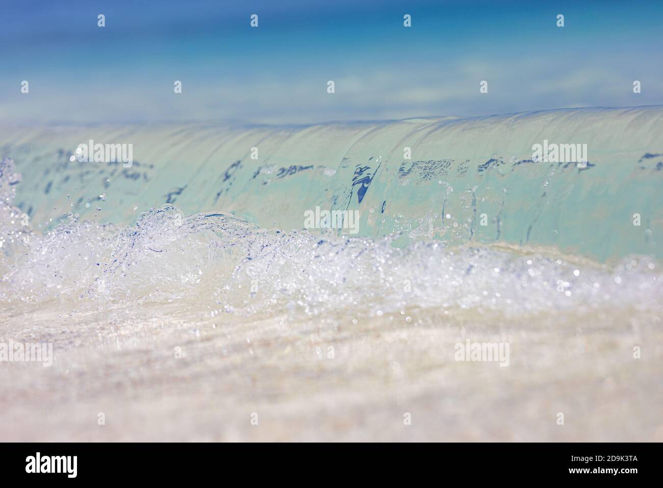 Closeup view of waves splashing sea beach sand sun daylight relaxation ...