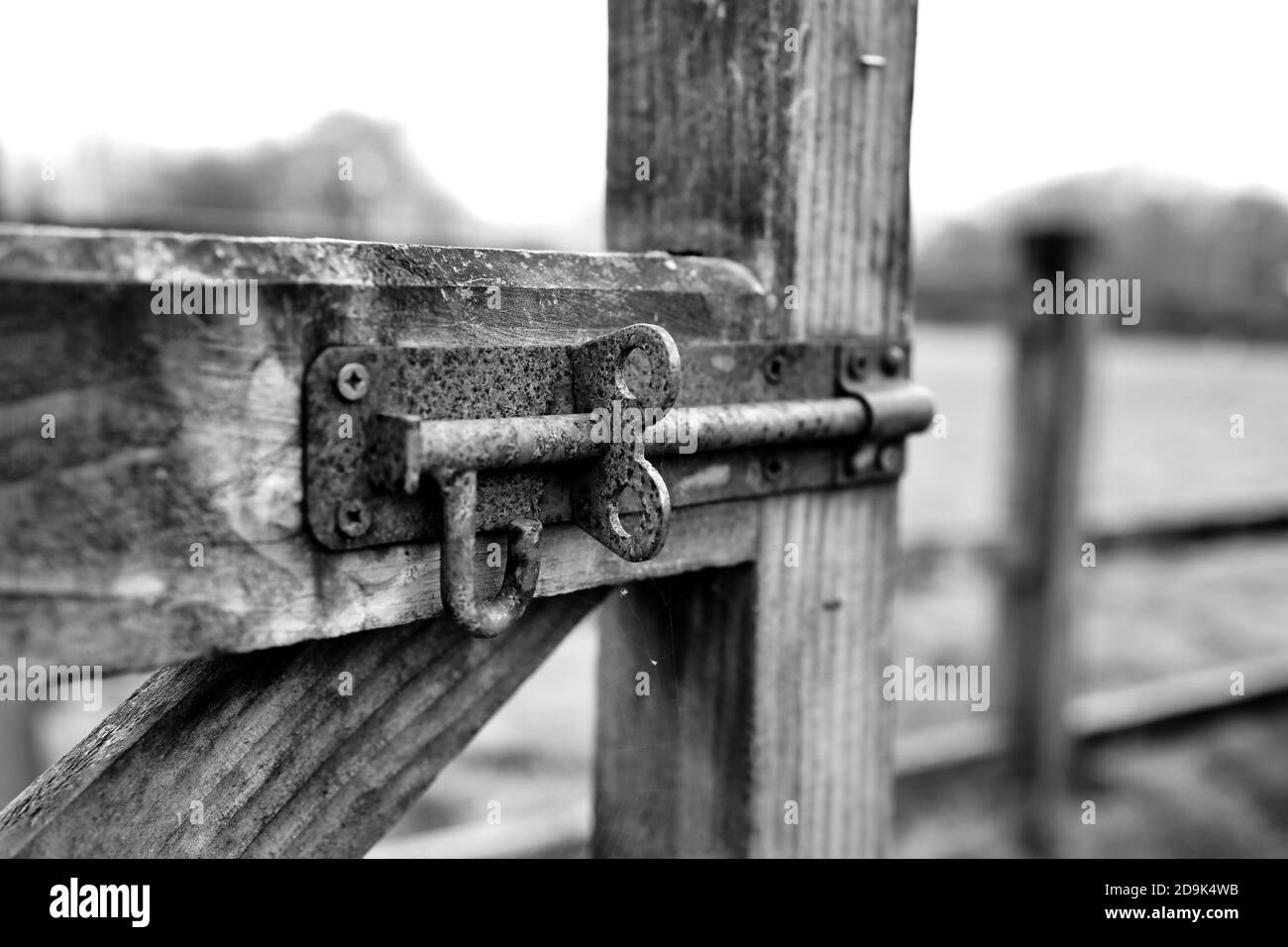 Gate to a field with bolted locking mechanism Stock Photo Alamy