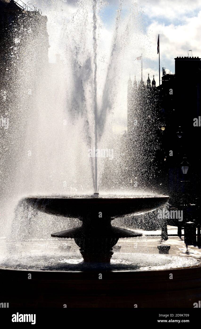 London, England, UK. Backlit fountain in Trafalgar Square Stock Photo