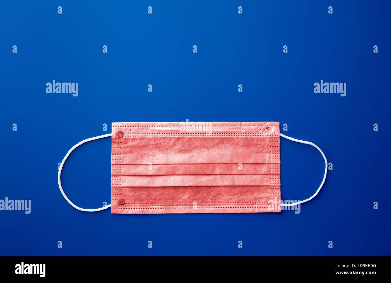 Medical mask, Medical protective mask on blue background. Disposable