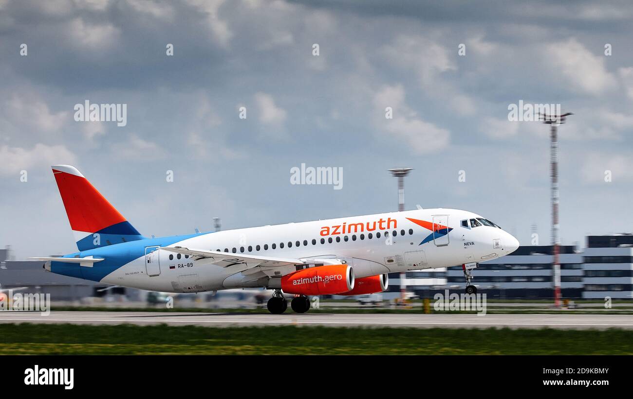 Aircraft Sukhoi Superjet 100 RA-89136 Azimut airlines takes off in airport Platov. takeoff on the background of the airport. Spotting at the airport Stock Photo