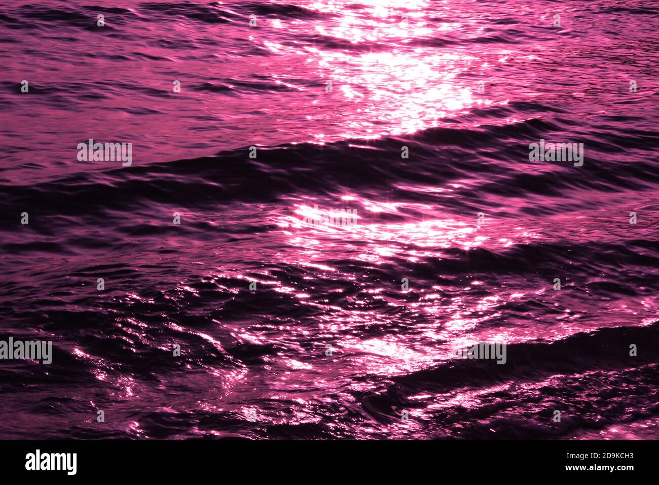 Magenta magical sea waves. Alien marvelous ocean. Beautiful image unreal surreal seascape. Stock Photo