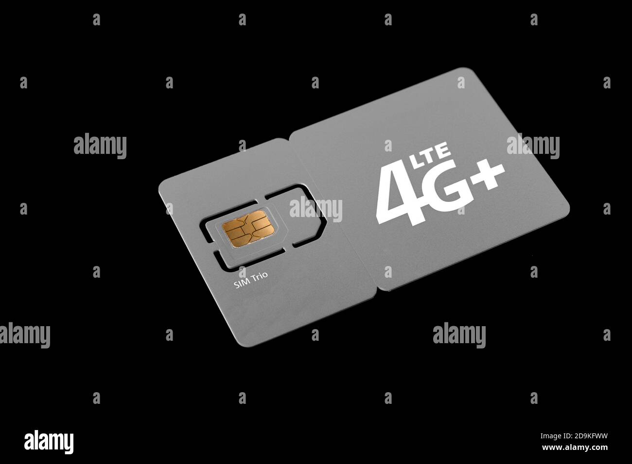 Dimensions of sim cards. Standard, micro and nano SIM card collected in card. SIM card for phone on a black background. Stock Photo