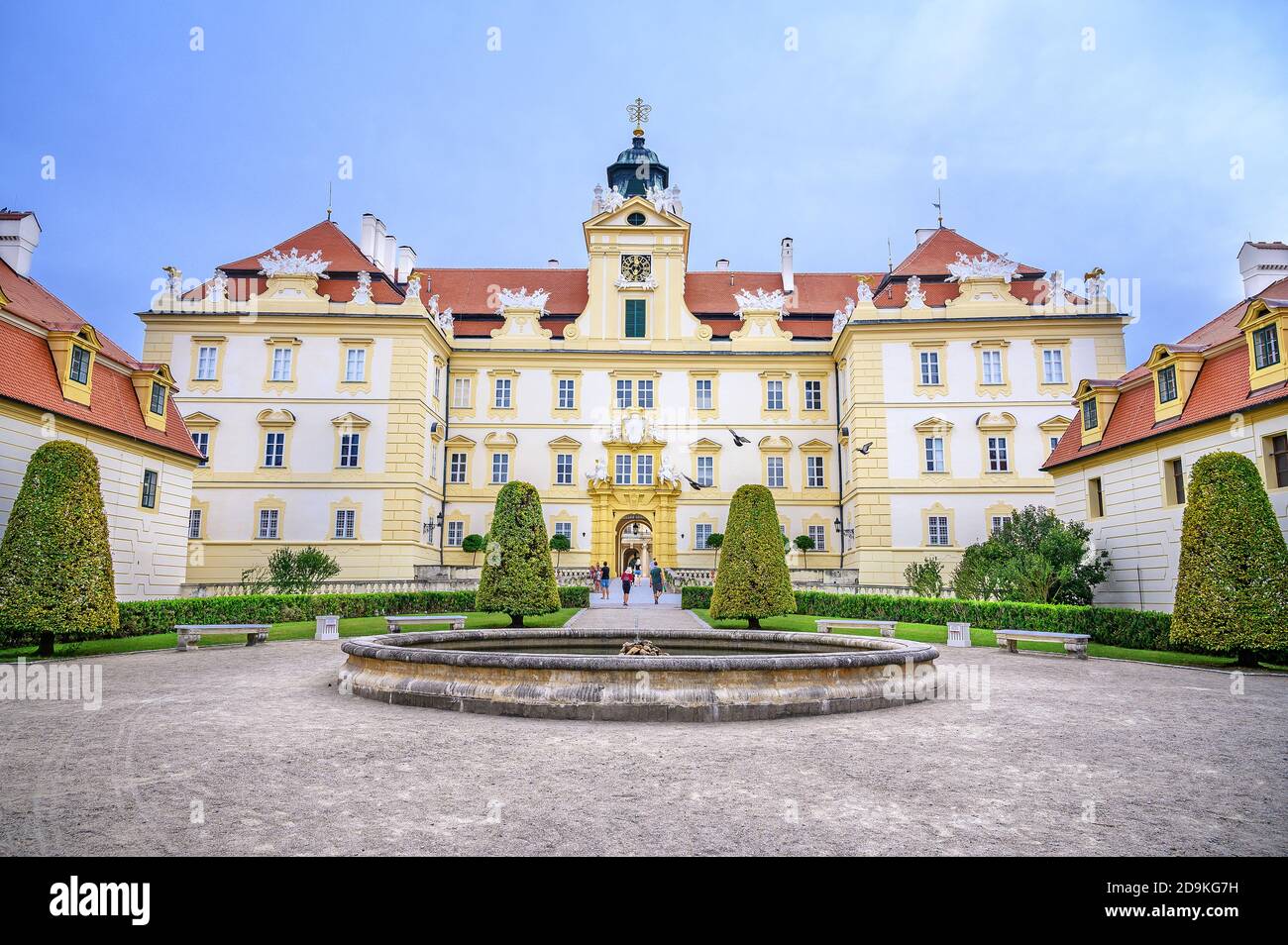 View of small water fountain and front facade of Valtice castle, UNESCO (Czech Republic) Stock Photo