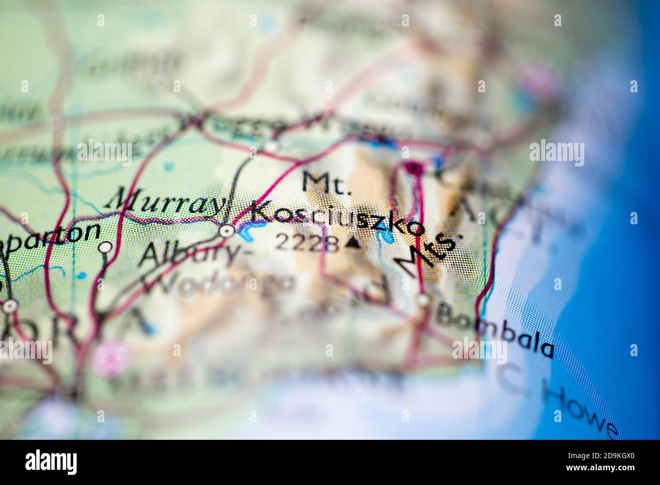 Shallow depth of field focus on geographical map location of Mount