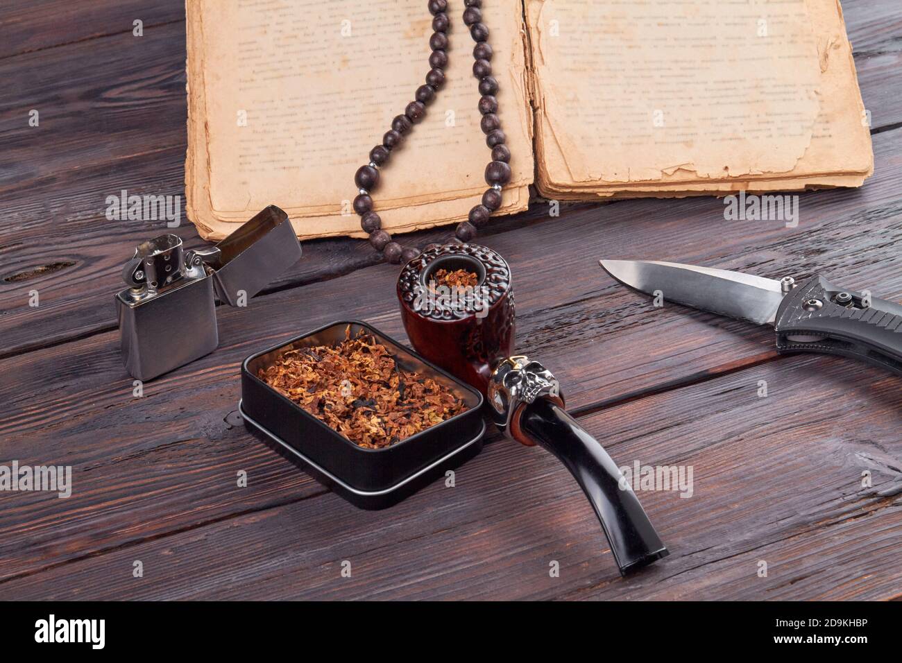 Stylish smoking pipe with lighter and knife Stock Photo Alamy