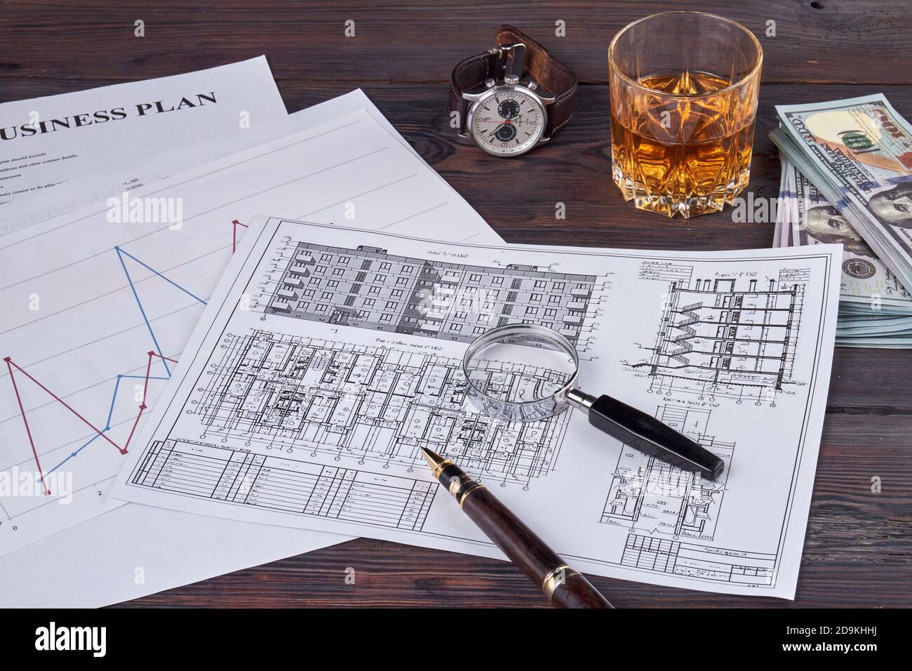 Business papers with building layout and pen Stock Photo Alamy