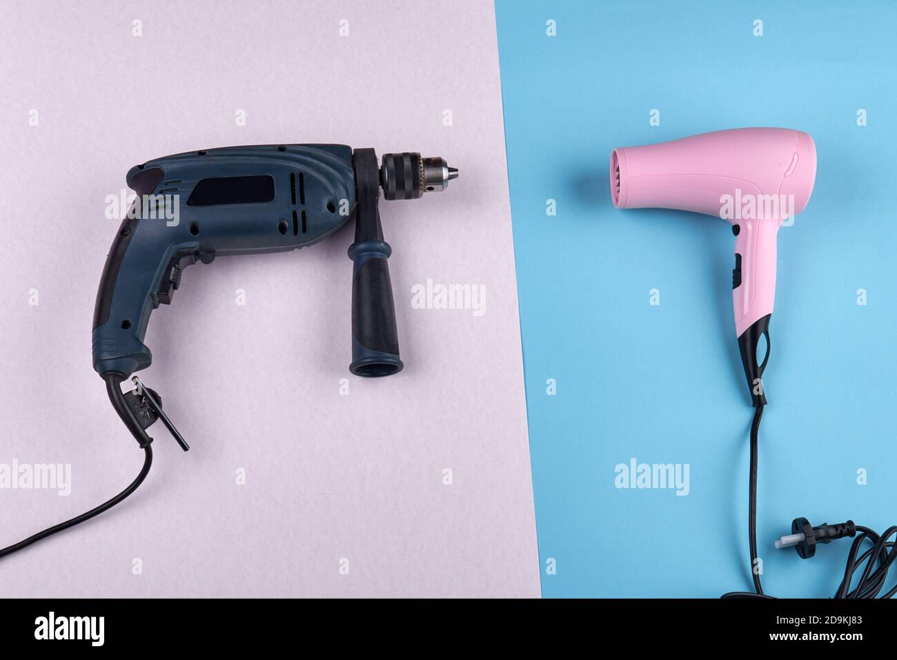 Power drill and hair dryer with cord Stock Photo Alamy