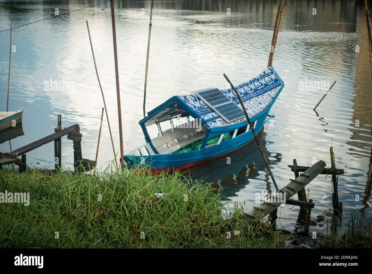 Fishing Boats By The Pier Of Sarawak River At Kampung Boyan, Kuching 