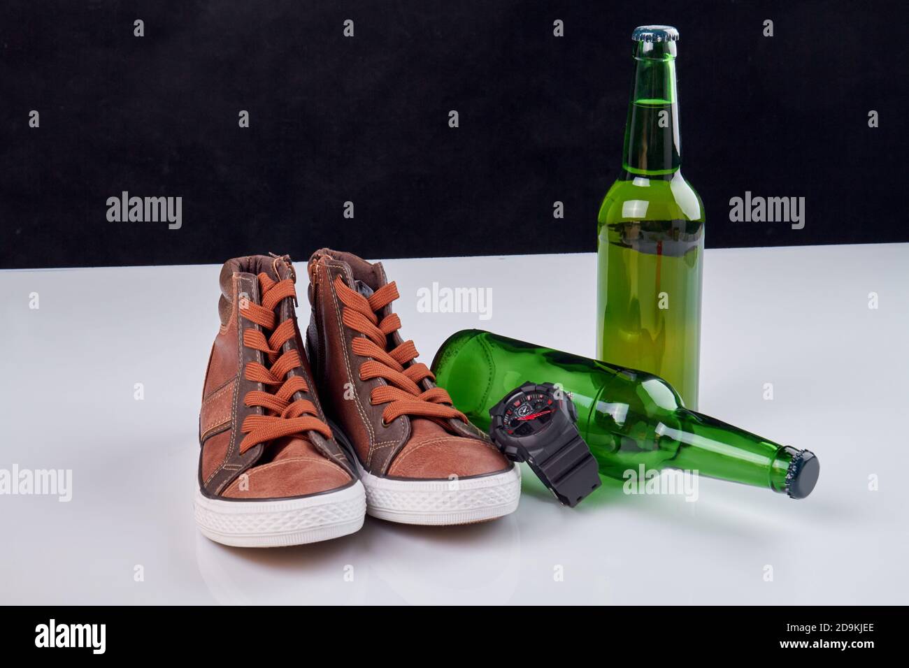 Pair of shoes with beer bottles Stock Photo Alamy