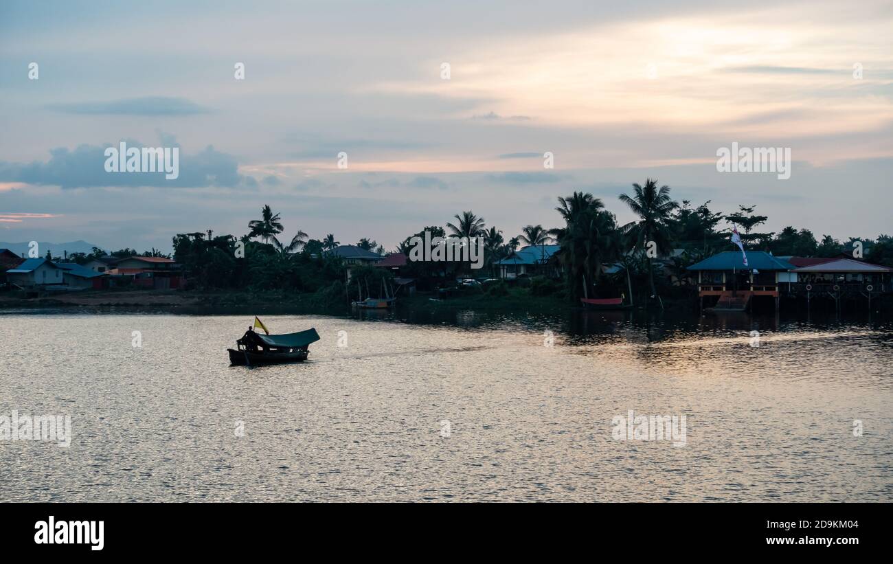 Sarawak River Cruise boat cruising along Sarawak River in Kuching ...