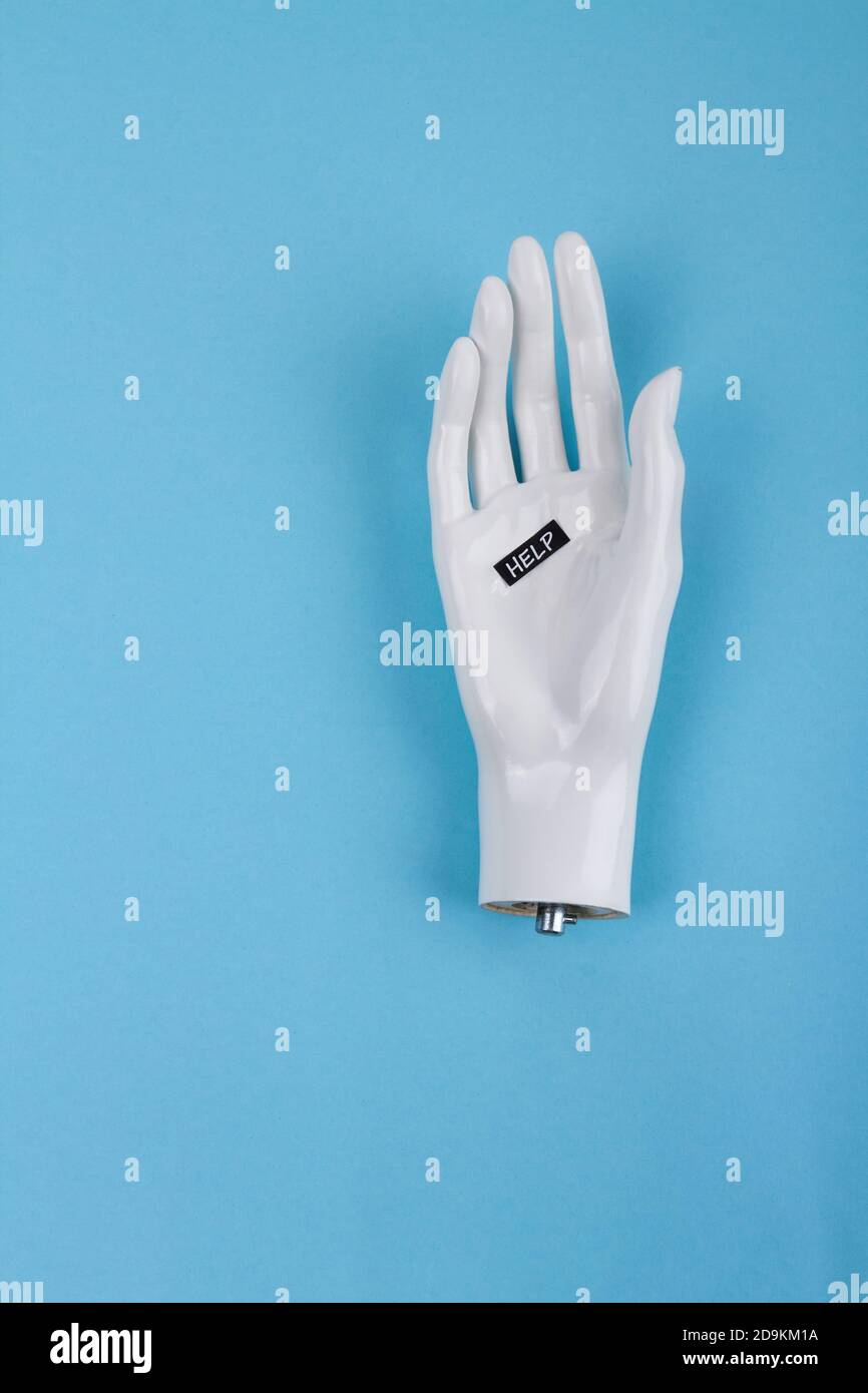 White mannequin hand with hope word. Stock Photo