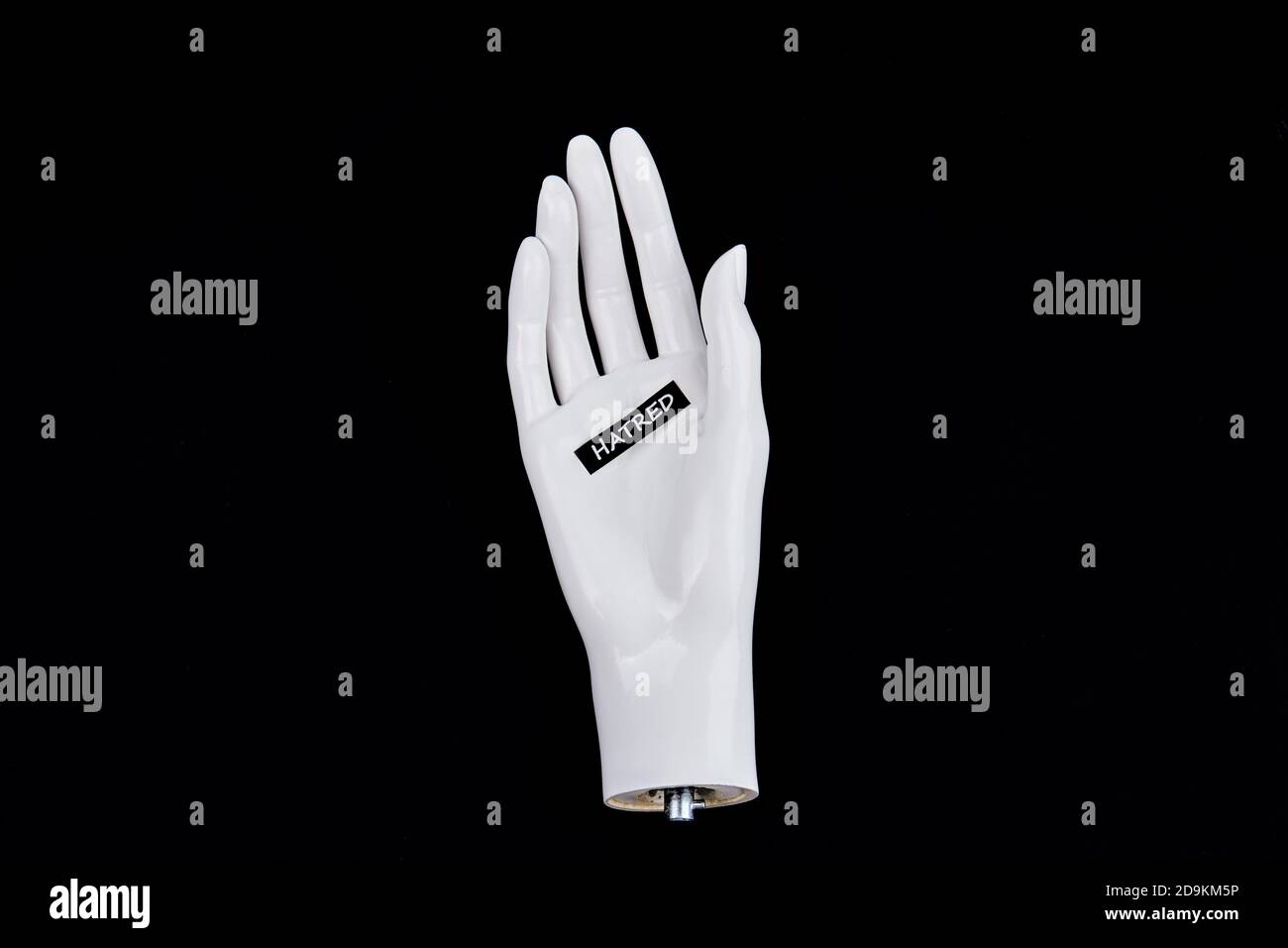 White hand and hatred word. Stock Photo